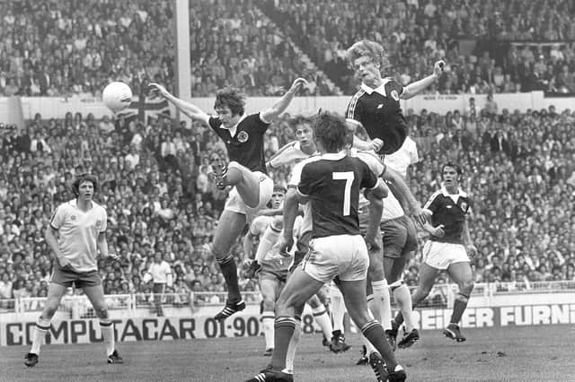Gordon McQueen soars above the England defence to score in Scotland's victory at Wembley in 1977. Picture: Denis Straughan