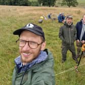 Metal detectorists Dariusz Gucwa, Mariusz Stepien and Damian Michalowski at the excavation site. PIC: Contributed.