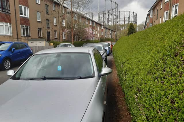 There is no space for a pedestrian to use this pavement let alone a wheelchair user. Picture: The Scotsman