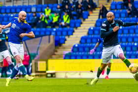 St Johnstone's Chris Kane scores his side's opener in the 3-1 defeat of Dundee - unusually both sides were allowed to play in blue (Photo by Roddy Scott / SNS Group)