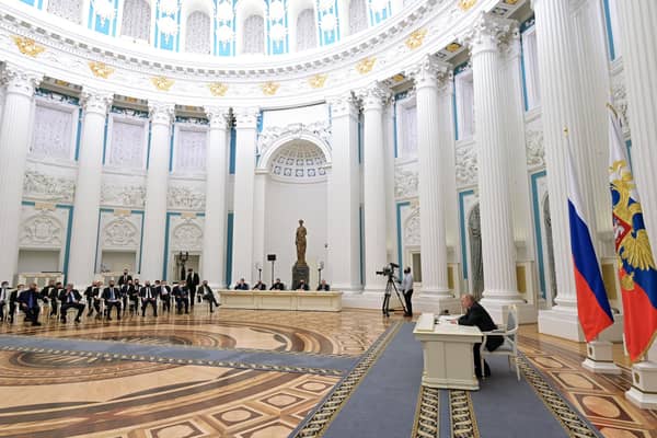 Vladimir Putin chairs a meeting of business leaders at the Kremlin yesterday, at which he said he wanted Russia to remain part of the world economy (Picture: Alexey Nikolsky/Sputnik/AFP via Getty Images)