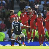 Leigh Griffiths scores his memorable second goal against England at Hampden Park in 2017 (Photo by Mike Hewitt/Getty Images)