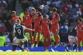 Leigh Griffiths scores his memorable second goal against England at Hampden Park in 2017 (Photo by Mike Hewitt/Getty Images)