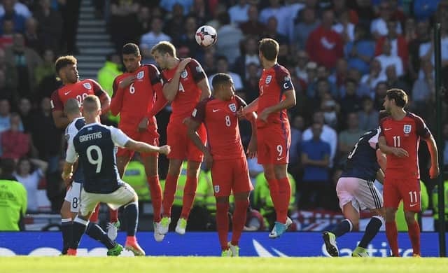 Leigh Griffiths scores his memorable second goal against England at Hampden Park in 2017 (Photo by Mike Hewitt/Getty Images)