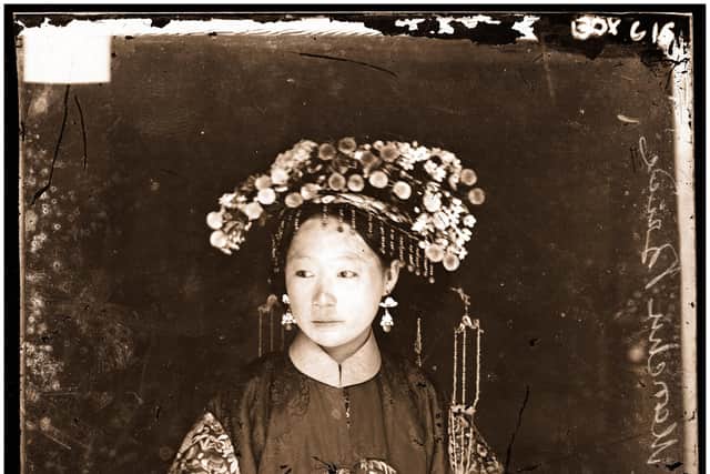 Thomson took many photographs of Manchu brides and their magnificent wedding costumes. He was sympathetic to the lives of these young teenage brides, which he reckoned to be a life of slavery, in which the wife ‘is even liable to be beaten by her mother-in-law, and husband too, if she neglects to discharge her duties as 'general domestic drudge’.