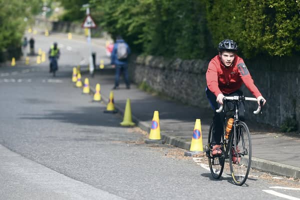 Cyclists and pedestrians on traffic-free Braid Road