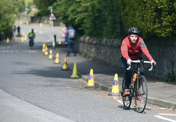 Cyclists and pedestrians on traffic-free Braid Road