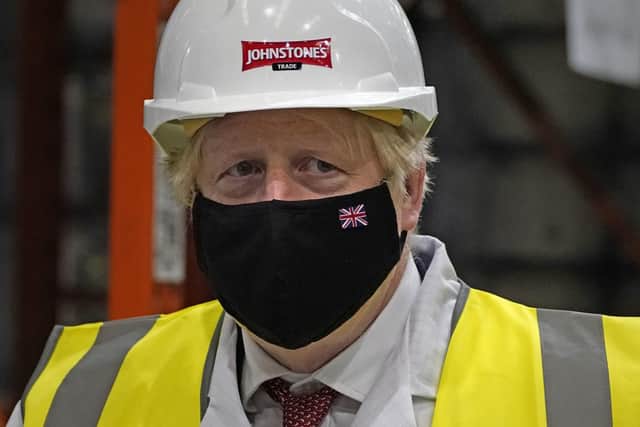 Prime Minister Boris Johnson during a visit to Johnstone's Paints Limited in Batley, West Yorkshire. Picture: Peter Byrne/PA Wire