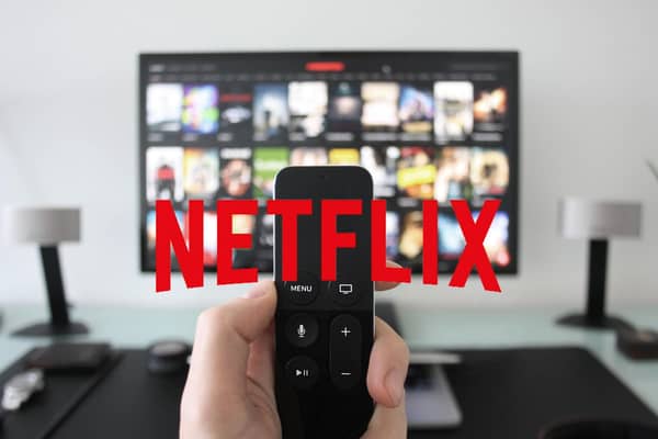 Do you need a TV license to stream Netflix? Photo credit: Logo: Netflix/Photo: Getty Images/Canva Pro