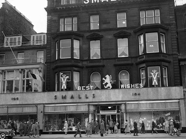 Smalls department store, owned by House of Fraser, closed its doors in 1977. In this photo, you can see a Royal wedding best wishes sign above the store, in 1960.