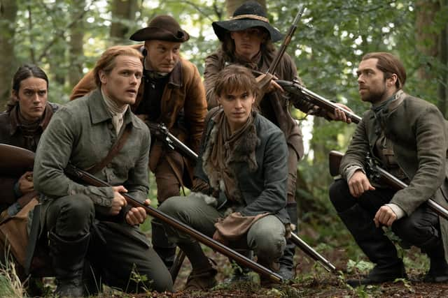 Cesar Domboy as Fergus, Sam Heughan as Jamie Fraser, Paul Gorman as Josiah/Keziah Beardsley, Jack Tarlton as Kenny Lindsay, Kenny Lindsay as Clyde MacKenzie and Richard Rankin as Roger Wakefield in Outlander. Picture: Photo by Starz!/Kobal/Shutterstock