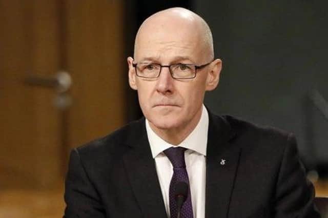 John Swinney says survivors were "failed" by the system