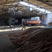 Ukrainian soldiers inspect a grain warehouse shelled by Russian forces near the frontlines of Kherson Oblast in Novovorontsovka (Picture:John Moore/Getty Images)