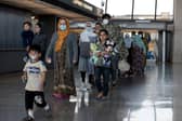 A fortunate few who fled Afghanistan were flown to freedom while others were forced to walk for days to escape the Taliban