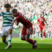 New Aberdeen defender Hayden Coulson had his work cut out against Celtic forward Jota.