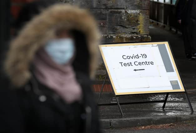A Covid-19 test centre sign at the entrance to the Glasgow Central Mosque in Glasgow. Glasgow remains in Level 3 restrictions despite the rest of mainland Scotland being in Level 2 picture: Andrew Milligan/PA