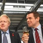 Former prime minister Boris Johnson and Douglas Ross