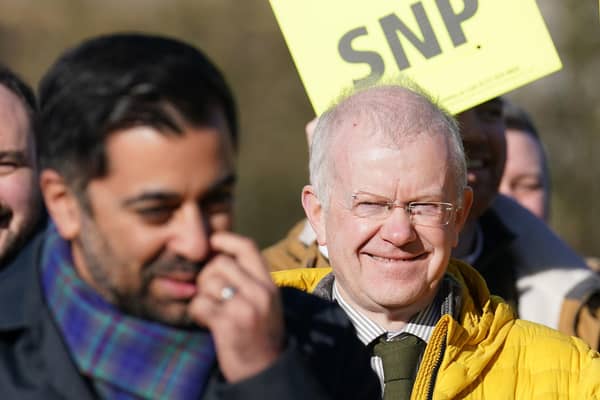 SNP MSP John Mason looks on at First Minister Humza Yousaf as the campaign at the Lord Roberts Monument in Kelvingrove Park, Glasgow. Photo: Andrew Milligan/PA Wire
