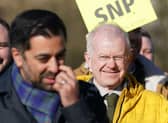 SNP MSP John Mason looks on at First Minister Humza Yousaf as the campaign at the Lord Roberts Monument in Kelvingrove Park, Glasgow. Photo: Andrew Milligan/PA Wire
