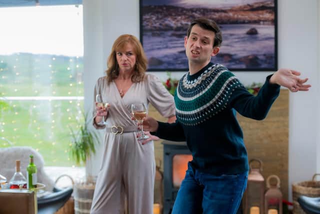 Gordon (Kieran Hodgson) enrages Cathy (Doon MacKichan) with his impression on her in Two Doors Down