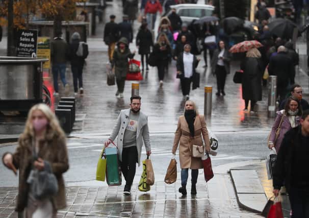 Members of the public carry shopping on Buchanan Street in Glasgow. Picture: PA