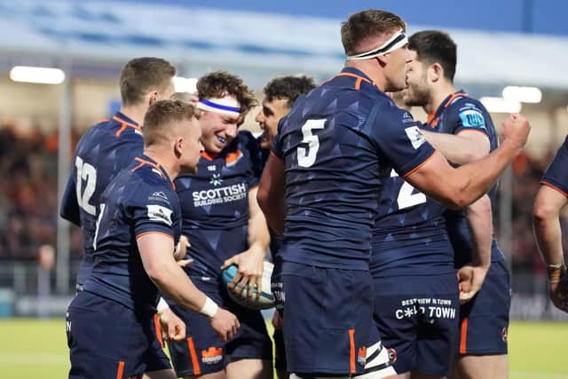 Hamish Watson celebrates scoring Edinburgh's fifth try during the win over Scarlets.