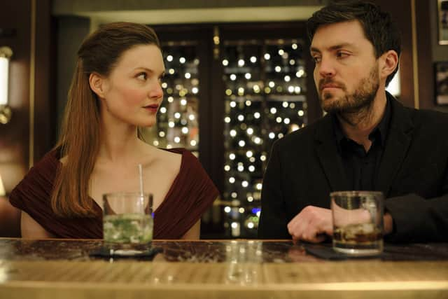 Holliday Granger and Tom Burke in Strike.