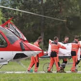 Rescue workers wheel Slovak Prime Minister Robert Fico, who was shot and injured, to a hospital in the town of Banska Bystrica, central Slovakia. Photo: Jan Kroslak/TASR via AP