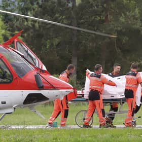 Rescue workers wheel Slovak Prime Minister Robert Fico, who was shot and injured, to a hospital in the town of Banska Bystrica, central Slovakia. Photo: Jan Kroslak/TASR via AP