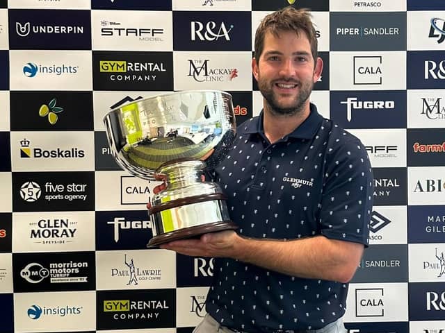 Bradley Neil shows off the trophy after winning the Tartan Pro Tour's Newmachar Classic presented by Boskalis by seven shots. Picture: Tartan Pro Tour