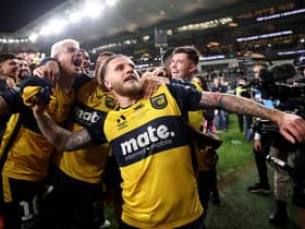 Jason Cummings of the Mariners celebrates winning the 2023 A-League Men's Grand Final match