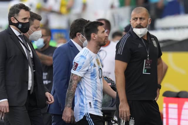Brazil vs Argentina abandoned: Argentina's Lionel Messi walks off the field after the qualifying soccer match for the FIFA World Cup Qatar 2022 against Brazil was interrupted by health officials in Sao Paulo, Brazil on Sunday 5 September. (Image credit: AP Photo/Andre Penner)
