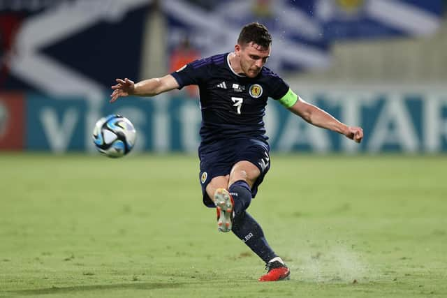 Scotland captain Andy Robertson plays the ball forward during the match against Cyprus.