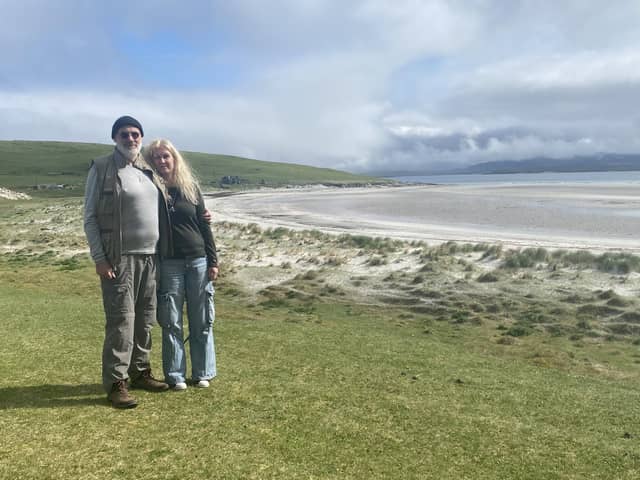 Fish and Simone on the stunning East Beach, on the doorstep of their new home on the island of Berneray