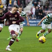 Lawrence Shankland makes it 1-1 from the spot v Celtic on the way to a historic but futile hat-trick (Photo by Craig Williamson / SNS Group)