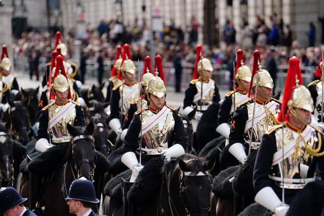 Members of the Household Cavalry follow the State Gun Carriage carrying the coffin of Queen Elizabeth II in the Ceremonial Procession following her State Funeral at Westminster Abbey. Picture: Getty Images