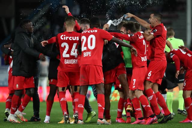 Standard Liege's players have had much to celebrate after a bright start to their Jupiler Pro League season - which came after a courtroom reprieve (Photo by VIRGINIE LEFOUR/BELGA MAG/AFP via Getty Images)