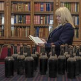 Bertie Troughton, resident trustee at Blair Castle in Perthshire, found 40 old bottles in an unassuming cellar room. They are now set to go up for auction. Picture: Lisa Ferguson