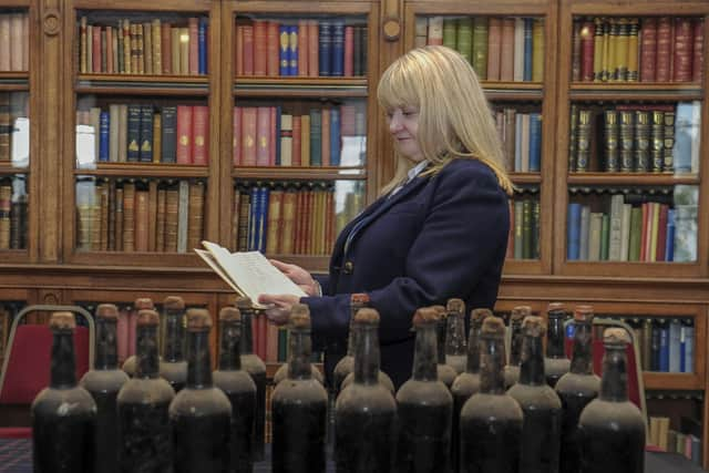 Bertie Troughton, resident trustee at Blair Castle in Perthshire, found 40 old bottles in an unassuming cellar room. They are now set to go up for auction. Picture: Lisa Ferguson