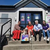 (L-R) Lynne Ogg, Scotmid communities manager, Sharon McSorley and Alan MacLeish, Scotmid regional committee members, Carrie Giannelli, Pet Aid co-ordinator and beagle Lily.