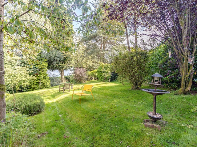 Exterior: Well-maintained grounds surround the house and contain an attractive driveway and shed. The bothy offers rental potential, and the property enjoys direct access to
22 acres of amenity woodland.
Contact: Halliday Homes