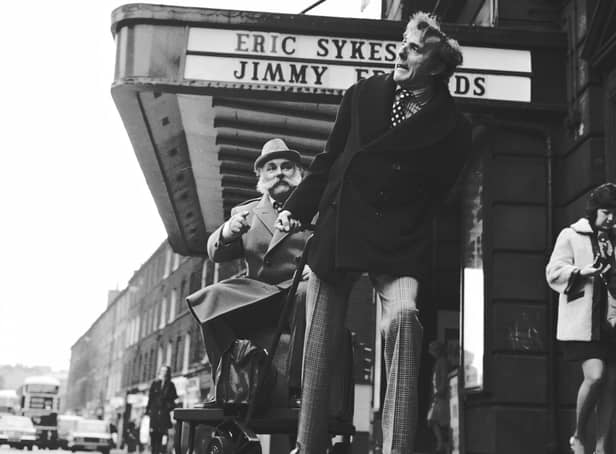 Actors and comedians Eric Sykes and Jimmy Edwards outside the King's Theatre, Edinburgh for Big Bad Mouse in February 1973.