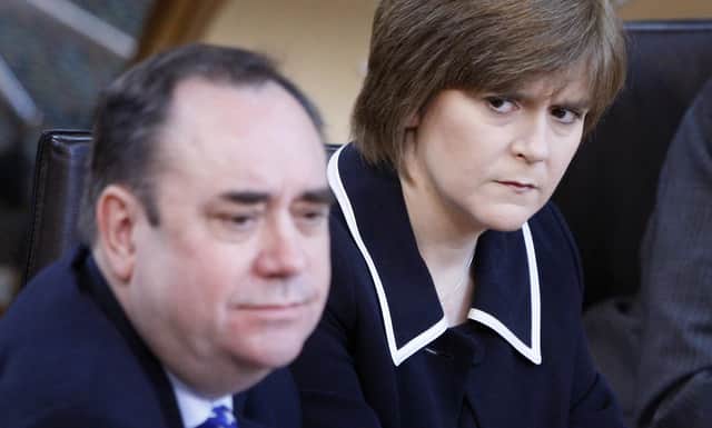 The then First Minister Alex Salmond and then Deputy First Minister Nicola Sturgeon are pictured in the Scottish Parliament in 2010 (Picture: Danny Lawson/PA Wire)