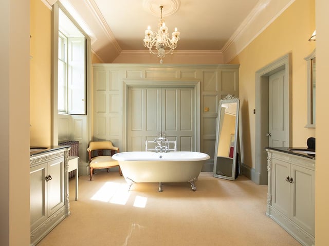 Interior: The accommodation retains many period features, but has been upgraded for modern life. The drawing room and open-plan kitchen-dining space have French doors, and there is a one-bedroom annexe to the rear ground floor. All five bedrooms upstairs are ensuite.