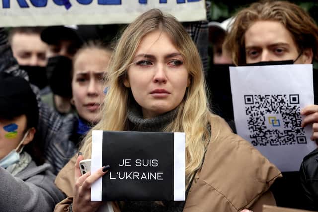 People protest against Russia's invasion of Ukraine in front of the Russian embassy in Paris (Picture: Thomas Coex/AFP via Getty Images)