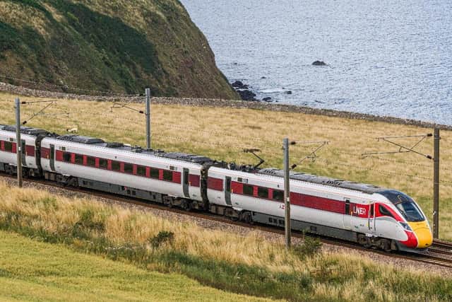 The Scottish Government is being urged to do more to cut train fares as train tickets from England to Scotland are set to be slashed by as much as half by the UK Government.