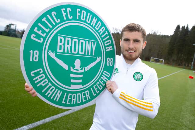 Jonjoe Kenny promotes the 'Broony' pin badge that will be sold in tribute to the outgoing club captain Scott Brown to raise funds for the Celtic Foundation. (Photo by Alan Harvey / SNS Group)