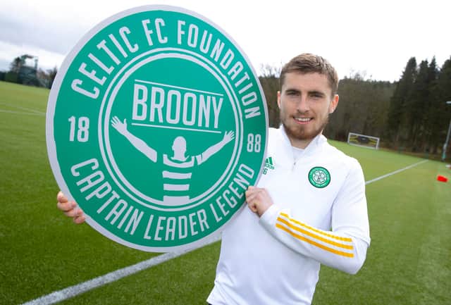 Jonjoe Kenny promotes the 'Broony' pin badge that will be sold in tribute to the outgoing club captain Scott Brown to raise funds for the Celtic Foundation. (Photo by Alan Harvey / SNS Group)