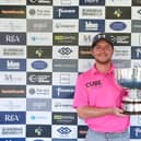 Calum  Fyfe shows off the trophy after carding a third successive 68 to win the Ladybank Masters presented by Piper Sandler. Picture: Tartan Pro Tour