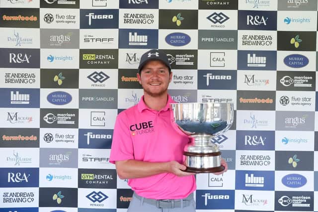 Calum  Fyfe shows off the trophy after carding a third successive 68 to win the Ladybank Masters presented by Piper Sandler. Picture: Tartan Pro Tour